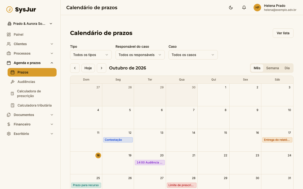 Calendário mensal de prazos: cada compromisso aparece como uma etiqueta colorida no dia, e a cor indica o tipo do prazo